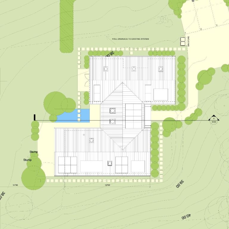 Site plan of a residential complex with gardens and pathways.