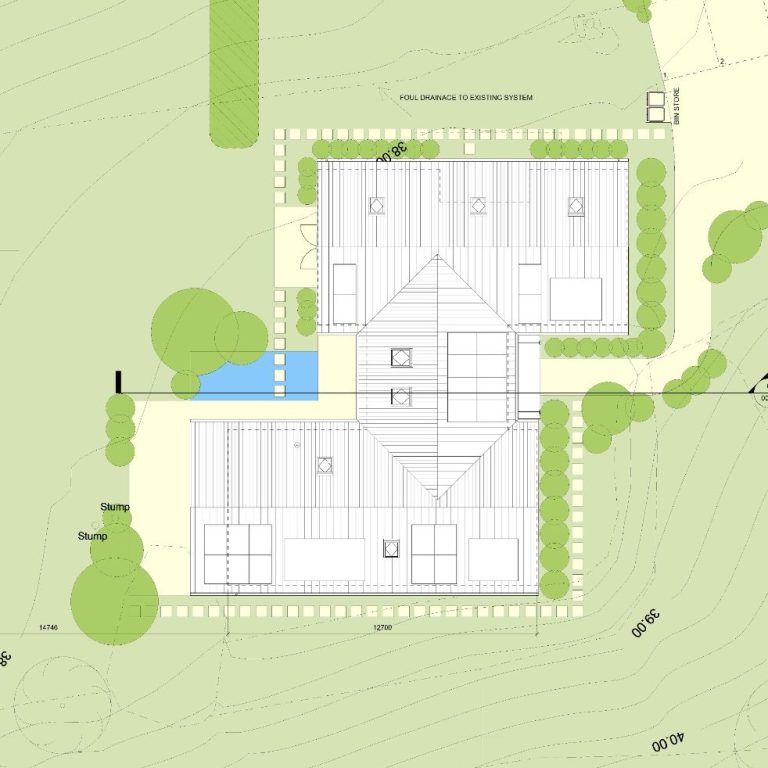 Modern two-storey house with a grey exterior and landscaped front garden.